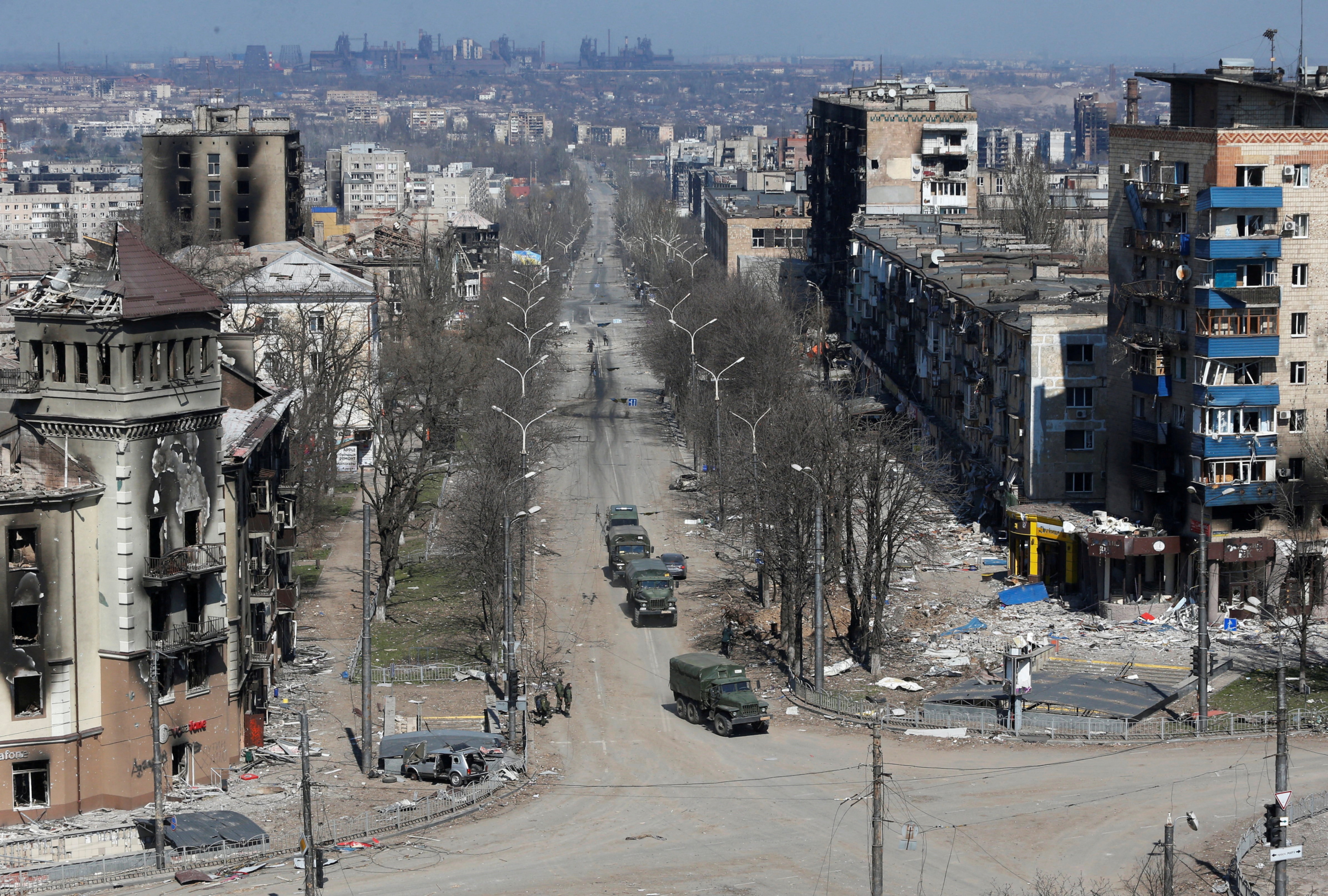 Military vehicles of pro-Russian troops drive along a street during Ukraine-Russia conflict in the southern port city of Mariupol.&nbsp; (Reuters file photo)