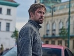 The Gray Man, directed by the Russo Brothers, stars Ryan Gosling. The Gray Man, directed by the Russo Brothers, stars Ryan Gosling.