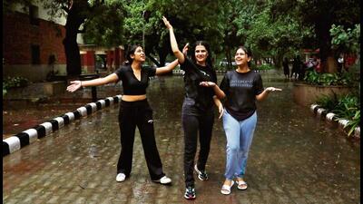 Tip Tip Barsa! (L-R) Ankita Dixit, Vanshika Arora and Yashika Khanna break into a rain dance inside Delhi School of Economics, on their first day of final year’s new session. (Photos: Dhruv Sethi/HT)