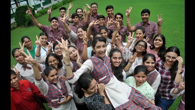 Students of KBDAV, Sector 7, Chandigarh, celebrating on the school campus after the declaration of the CBSE Class-12 results on Friday. (Ravi Kumar/HT) Students of KBDAV, Sector 7, Chandigarh, celebrating on the school campus after the declaration of the CBSE Class-12 results on Friday. (Ravi Kumar/HT)