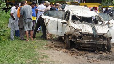 The car in which the bodies of the four members of the family were found after it was recovered from the Sirhind Feeder Canal in Faridkot on Friday. (HT Photo) The car in which the bodies of the four members of the family were found after it was recovered from the Sirhind Feeder Canal in Faridkot on Friday. (HT Photo)
