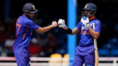 India's captain Shikhar Dhawan, right, and Shubman Gill knock to celebrate a fifty runs partnership against West Indies (AP) India's captain Shikhar Dhawan, right, and Shubman Gill knock to celebrate a fifty runs partnership against West Indies (AP)