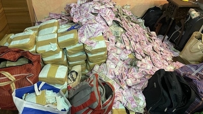 The ED said it seized cash worth ₹20 crore from the residence of Bengal minister Partha Chatterjee's close aide. (ANI/Twitter) The ED said it seized cash worth ₹20 crore from the residence of Bengal minister Partha Chatterjee's close aide. (ANI/Twitter)