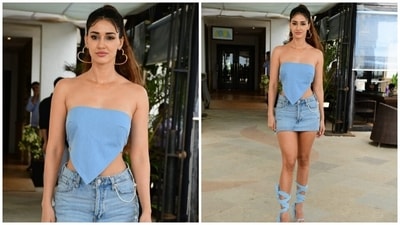 Disha paired the top with a mini denim skirt featuring an embellished silver waist belt, low rise waist, and distressed hem. Lastly, she completed the styling with a pair of heart-shaped hoop earrings, colourful statement rings, a sleek gold chain, and high heels with gladiator straps. (HT Photo/Varinder Chawla) Disha paired the top with a mini denim skirt featuring an embellished silver waist belt, low rise waist, and distressed hem. Lastly, she completed the styling with a pair of heart-shaped hoop earrings, colourful statement rings, a sleek gold chain, and high heels with gladiator straps. (HT Photo/Varinder Chawla)