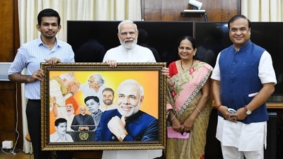 Abhijeet Gotani with Prime Minister Narendra Modi and Assam chief minister in Delhi. Abhijeet Gotani with Prime Minister Narendra Modi and Assam chief minister in Delhi.