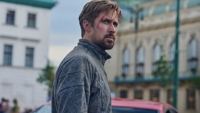 The Gray Man, directed by the Russo Brothers, stars Ryan Gosling. The Gray Man, directed by the Russo Brothers, stars Ryan Gosling.