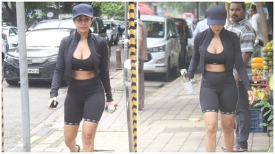 Malaika completed the outfit with high waist cycling shorts featuring a bodycon fitting and printed hem. A black cap, matching flip flops and a sleek ponytail rounded it all off. (HT Photo/Varinder Chawla)