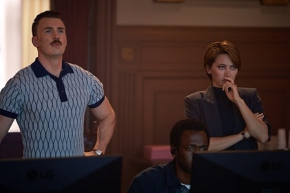 Chris Evans and Jessica Henswick in a still from The Gray Man. Chris Evans and Jessica Henswick in a still from The Gray Man.