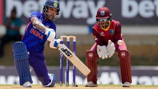 India's captain Shikhar Dhawan plays the shot to be caught for 97 runs by West Indies' Shamarh Brooks during the first ODI(AP)