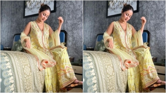 Hina decked up in a sleeveless yellow kurta featuring a plunging neckline and geometric patterns in yellow and orange. The kurta also came decorated in sleek silver zari and amped the glam factor.(Instagram/@realhinakhan)