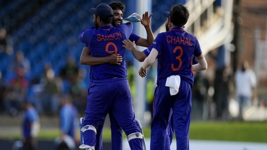 Teammates embrace India's bowler Mohammed Siraj&nbsp;after defeating West Indies by three runs(AP)