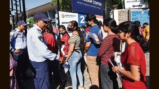 Students arrive to appear for the first slot of Common University Entrance Test for undergraduate admissions, New Delhi, July 15, 2022 (Amal KS / Hindustan Times)