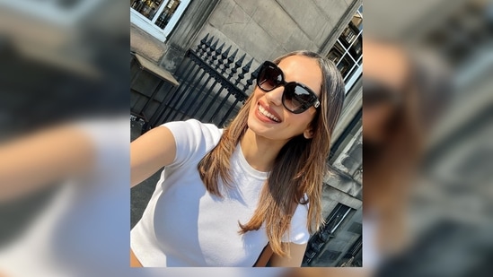 Manushi Chhillar accessorised her stylish casual look with a Louis Vuitton handbag and huge sunglasses.(Instagram/@manushi_chhillar)