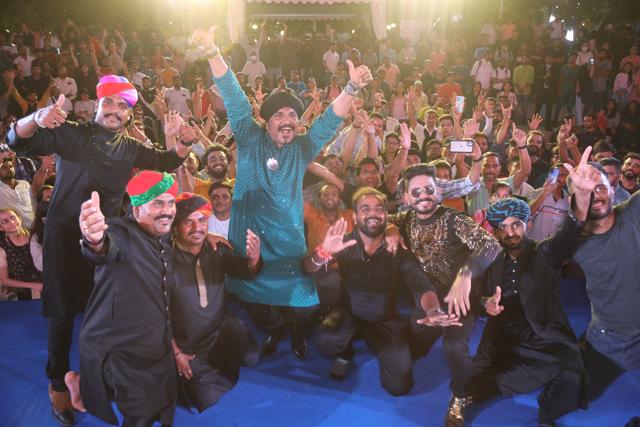 Kutle Khan and his accompanying artistes click a selfie with the crowd at CyberHub, Gurugram. Kutle Khan and his accompanying artistes click a selfie with the crowd at CyberHub, Gurugram.