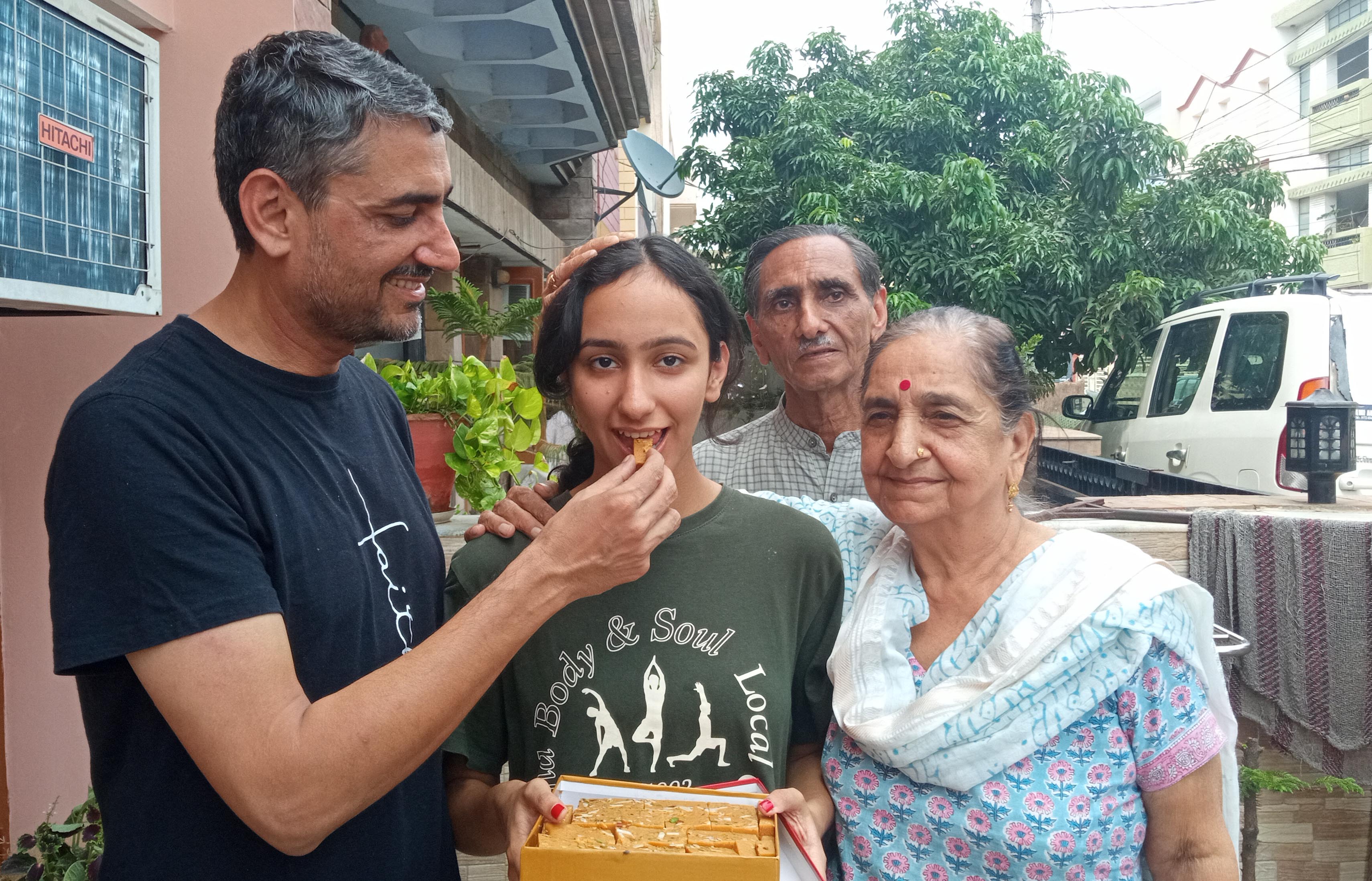 Mannat Sharma celebrating with her family in Panchkula. (Sant Arora/HT) Mannat Sharma celebrating with her family in Panchkula. (Sant Arora/HT)