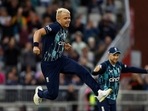 England's Sam Curran celebrates after taking the wicket of South Africa's David Miller