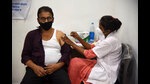 A beneficiary gets his booster dose against Covid in Navi Mumbai. (BACHCHAN KUMAR/HT PHOTO) A beneficiary gets his booster dose against Covid in Navi Mumbai. (BACHCHAN KUMAR/HT PHOTO)