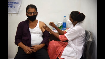 A beneficiary gets his booster dose against Covid in Navi Mumbai. (BACHCHAN KUMAR/HT PHOTO)