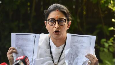 Union minister Smriti Irani addresses a press conference at her residence in New Delhi on Saturday. (PTI PHOTO.)