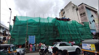 Vishrambaugwada covered with green cloth as PMC undertakes restoration works, on Saturday. Vishrambaugwada and upper floor of Lal Mahal are out of bounds to tourists as Pune Municipal Corporation is yet to complete restoration and renovation works. (RAVINDRA JOSHI/HT) Vishrambaugwada covered with green cloth as PMC undertakes restoration works, on Saturday. Vishrambaugwada and upper floor of Lal Mahal are out of bounds to tourists as Pune Municipal Corporation is yet to complete restoration and renovation works. (RAVINDRA JOSHI/HT)