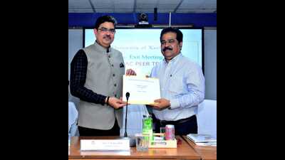 Lucknow University (LU) vice chancellor Prof Alok Kumar Rai receiving the summary of recommendations and findings by prof BB Biswal, director at the National Institute of Technology (NIT), Meghalaya who led the 8 members NAAC team in Lucknow. (Sourced)