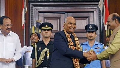 New Delhi, July 23 (ANI): President Ram Nath Kovind shakes hands with Lok Sabha Speaker Om Birla at his farewell ceremony, as Vice President M Venkaiah Naidu looks on, at Parliament's Central Hall, in New Delhi on Saturday. (ANI Photo) (ANI) New Delhi, July 23 (ANI): President Ram Nath Kovind shakes hands with Lok Sabha Speaker Om Birla at his farewell ceremony, as Vice President M Venkaiah Naidu looks on, at Parliament's Central Hall, in New Delhi on Saturday. (ANI Photo) (ANI)