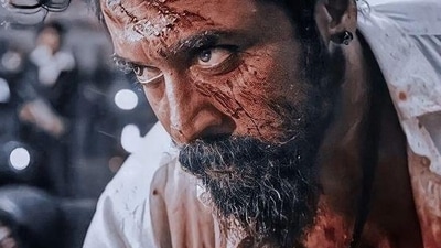 Suriya in a different avatar--as the villain Rolex in Kamal Haasan's Vikram. Suriya in a different avatar--as the villain Rolex in Kamal Haasan's Vikram.