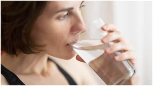 Drinking water can help promote happy hormones (Unsplash)