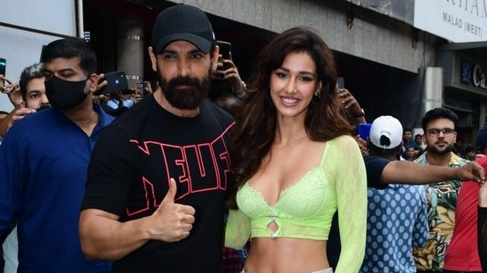 John Abraham and Disha Patani pose for pictures on Saturday, Their film is a sequel to the 2014 hit film, Ek Villain, which starred Sidharth Malhotra, Shraddha Kapoor and Riteish Deshmukh. (Varinder Chawla)