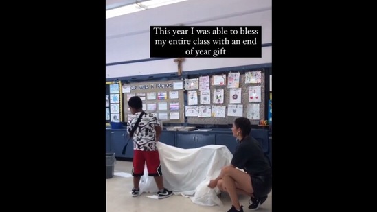 The image, taken from the Instagram video, shows the teacher with one of her student. (Instagram/@goodnews_movement)
