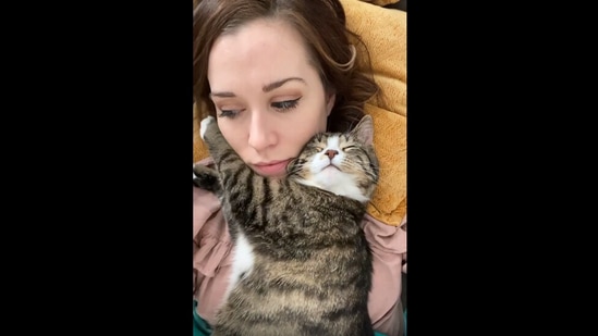 Cat Embraces Owner After Getting Adopted