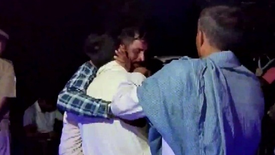 People console kin of Kanwar devotee who was mowed down by truck in Hathras. (ANI)