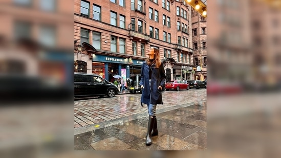 Manushi Chhillar donned a black turtle neck which she teamed with denim, a blue trench coat and black boots.(Instagram/@manushichhillar)