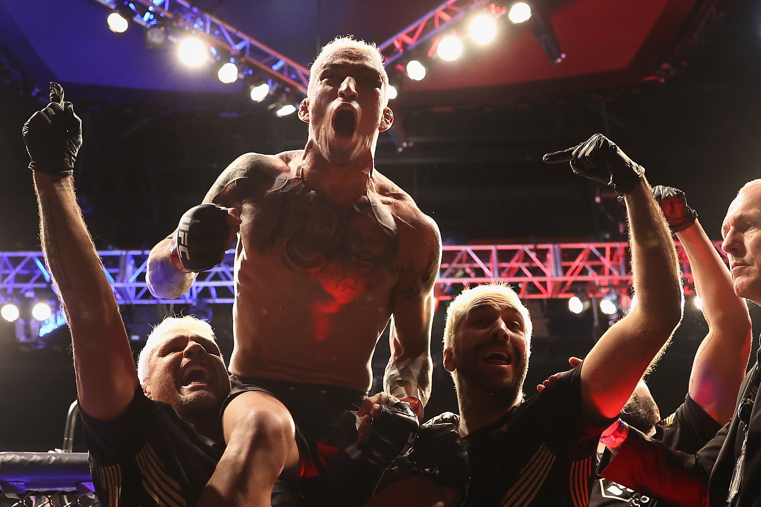 Charles Oliveira celebrates after his submission victory over Justin Gaethje (AFP) Charles Oliveira celebrates after his submission victory over Justin Gaethje (AFP)