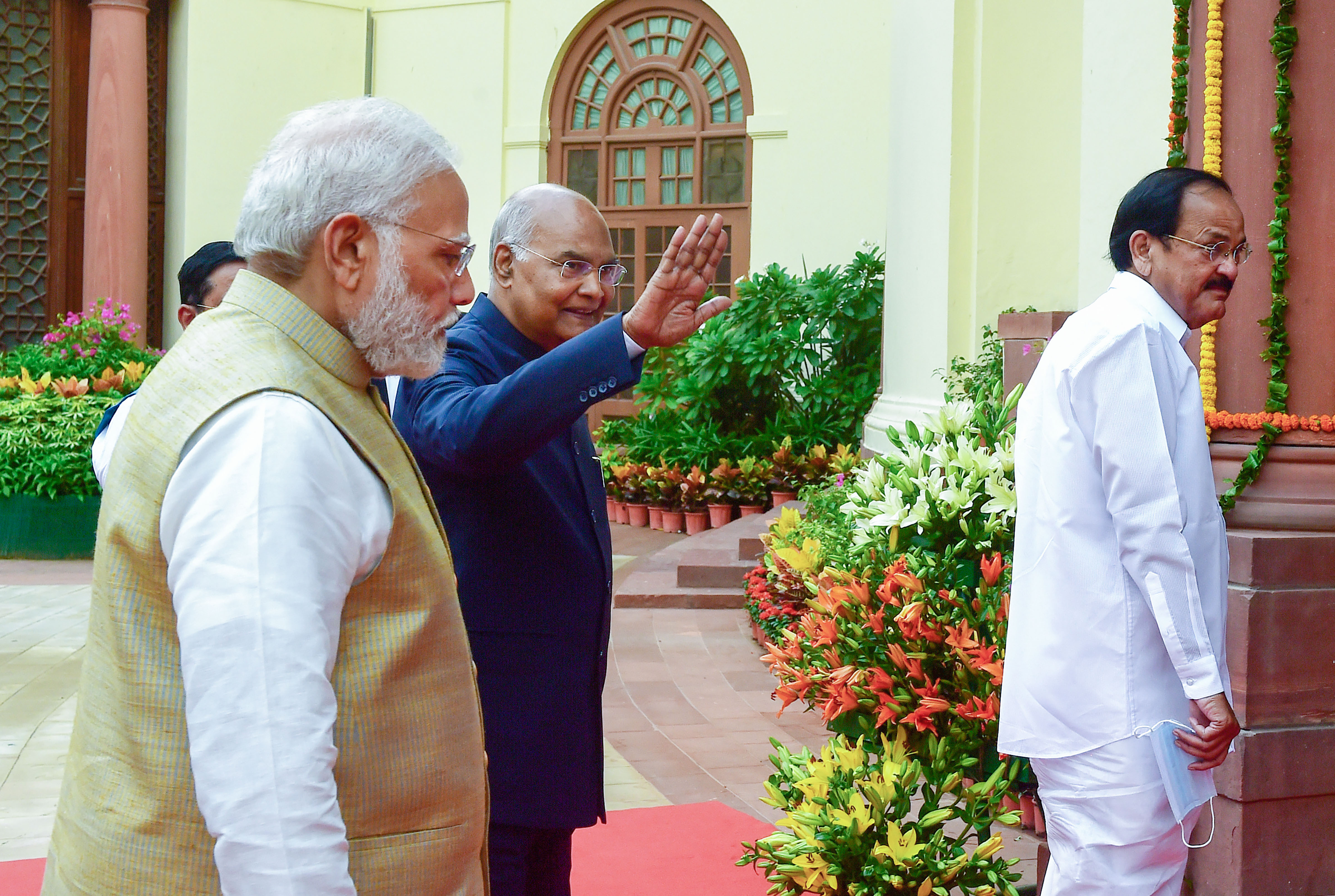Outgoing President Ram Nath Kovind, Vice President Venkaiah Naidu and Prime Minister Narendra Modi arrive in a ceremonial procession to attend the farewell function of the outgoing president, at Parliament House Complex in New Delhi. (PTI) Outgoing President Ram Nath Kovind, Vice President Venkaiah Naidu and Prime Minister Narendra Modi arrive in a ceremonial procession to attend the farewell function of the outgoing president, at Parliament House Complex in New Delhi. (PTI)