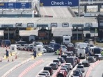Vehicles queue at the border control booths at the Port of Dover, in Dover, Britain, July 24, 2022.&nbsp;