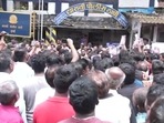 Crowd gathers outside Dharavi Police Station on Sunday. (ANI Twitter) Crowd gathers outside Dharavi Police Station on Sunday. (ANI Twitter)