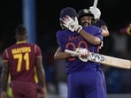 India's Axar Patel is embraced by teammate Mohammed Siraj after hitting a six to win the second ODI (AP)