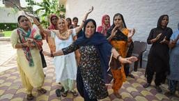 The women of Neeraj Chopra's family, including his mother, start dancing to celebrate his achievement.  Tokyo Olympics gold medalist Neeraj is the first Indian to win a silver medal at the World Championships in Athletics and only the country's second medalist after Anju Bobby George won in 2003. (HT Photo )