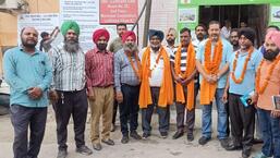 Members of MC Driver and Karamchari Union pose for a picture with elected representatives of the union in Ludhiana. (HT PHOTO)