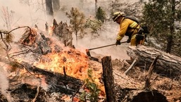 A fast-moving wildfire near Yosemite National Park exploded in size Saturday into one of California's largest wildfires of the year, prompting evacuation orders for thousands of people and shutting off power to more than 2,000 homes and businesses.&nbsp;