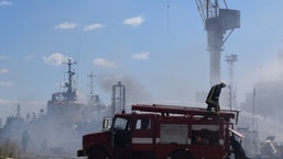 Firefighters work at a site of a Russian missile strike in a sea port of Odesa, as Russia's attack on Ukraine continues.