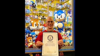 The image shows Barry Evans holding a Guinness World Records certificate for the 'largest collection of Sonic the Hedgehog memorabilia'. (Guinness World Records) The image shows Barry Evans holding a Guinness World Records certificate for the 'largest collection of Sonic the Hedgehog memorabilia'. (Guinness World Records)