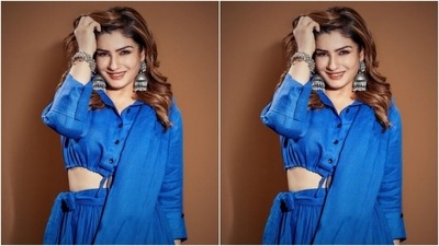 Raveena played muse to fashion designer house Chola and picked a blue ensemble for the pictures. (Instagram/@officialraveenatandon)