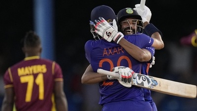 India's Axar Patel is embraced by teammate Mohammed Siraj after hitting a six to win the second ODI (AP) India's Axar Patel is embraced by teammate Mohammed Siraj after hitting a six to win the second ODI (AP)