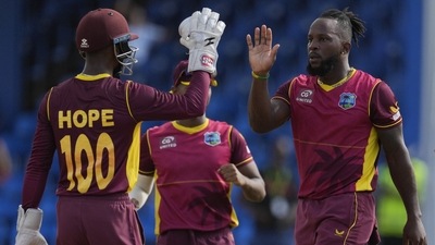West Indies' Kyle Mayers celebrates with captain Shai Hope the dismissal of India's Suryakumar Yadav during the second ODI (AP) West Indies' Kyle Mayers celebrates with captain Shai Hope the dismissal of India's Suryakumar Yadav during the second ODI (AP)