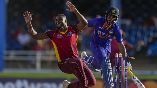 West Indies' Romario Shepherd celebrates dismissing India's Axar Patel&nbsp;during the second ODI&nbsp;(AP)