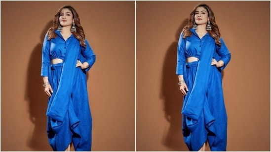 रवीना, मेकअप आर्टिस्ट शूरा बहविन द्वारा असिस्ट की गई, न्यूड आईशैडो, ब्लैक आईलाइनर, ब्लैक कोहल, मस्कारा से लदी पलकें, खींची हुई आइब्रो, कंटूरेड गाल और सॉफ्ट ऑरेंज लिपस्टिक के शेड में सजी। (Instagram/@officialraveenatandon)