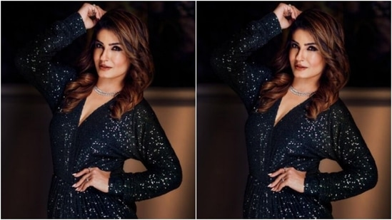 गाउन में सिल्वर थ्रेड्स में सेक्विन डिटेल्स, प्लंजिंग नेकलाइन और एक जांघ हाई स्लिट था।  डायमंड चोकर में रवीना ने अपने लुक को सही ढंग से एक्सेसराइज़ किया।(Instagram/@officialraveenatandon)