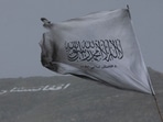 The Taliban flag is seen in a marketplace in Kabul, Afghanistan.
